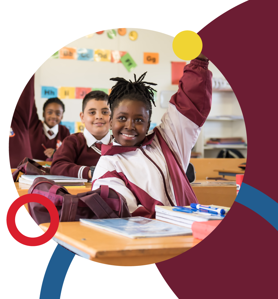 Three Riverside College Primary School learners participating and asking questions during a lesson